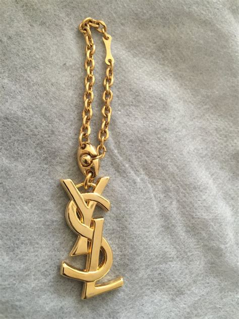 Yves Saint Laurent Bag Charm .